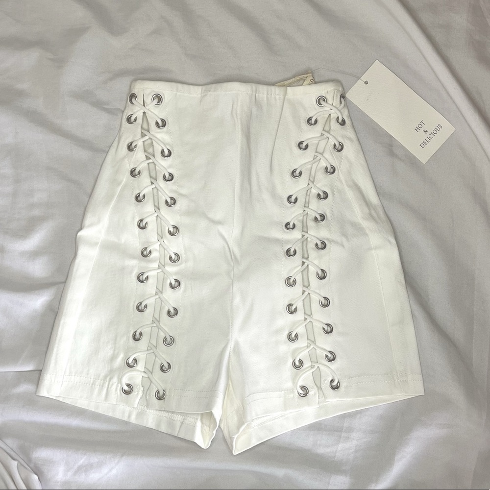 Hot & delicious white shorts brand new, size small